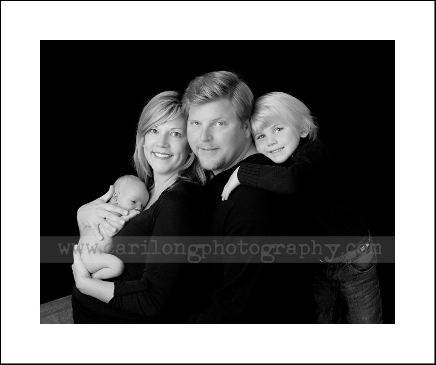 This family portrait of a newborn baby boy was taken at our studio in downtown Cary, NC.